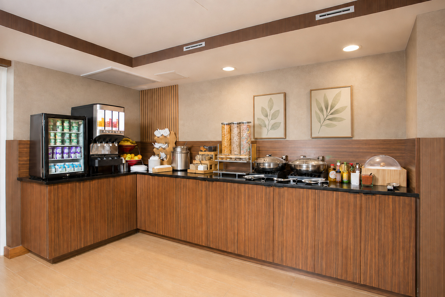 A thoughtfully presented hotel breakfast buffet with fresh fruit, pastries and cereal dispensers